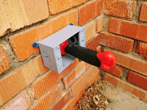 Exterior Outlet: Finishing Hole with Drywall Saw